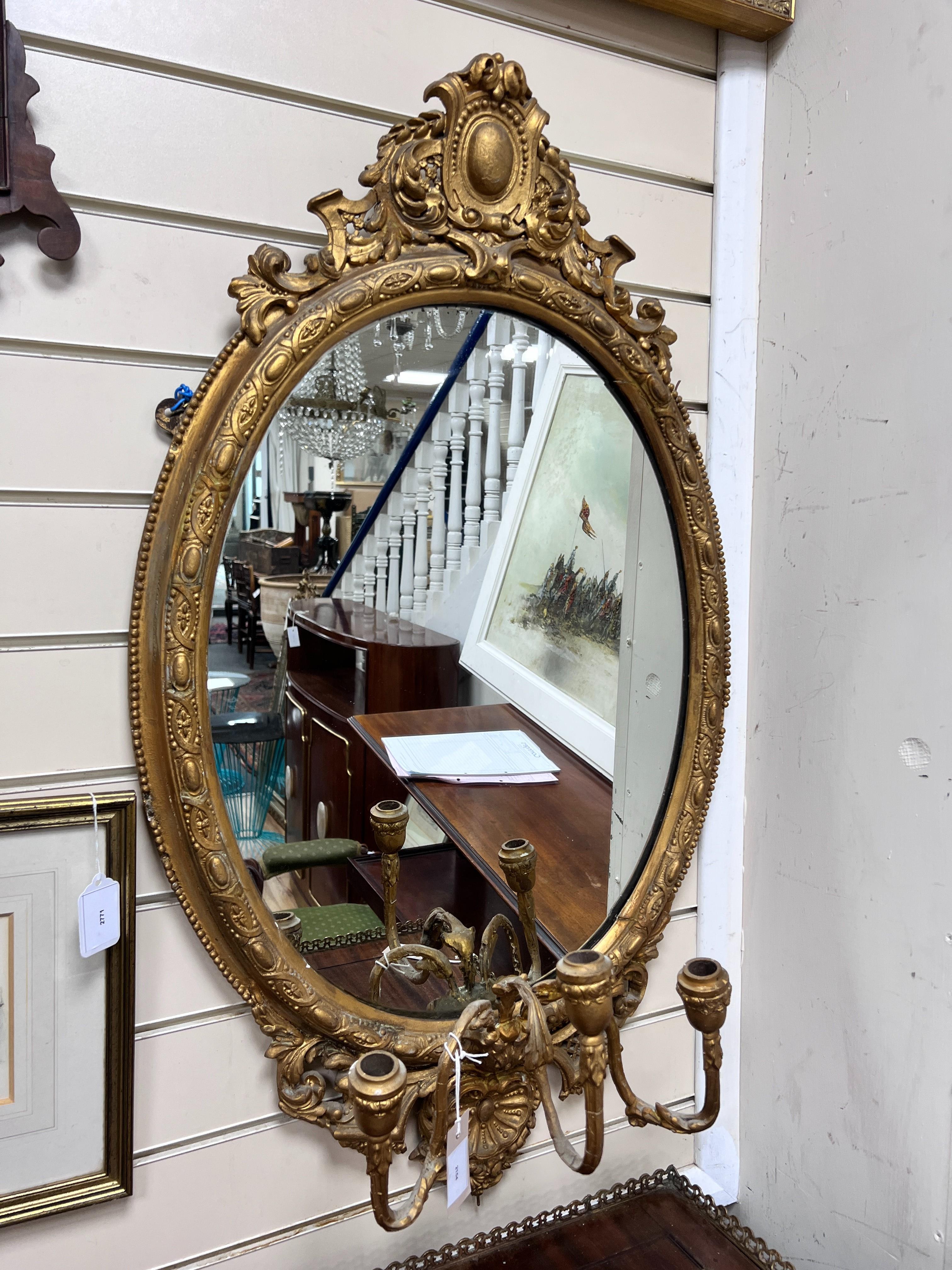 A Victorian giltwood and gesso girandole, width 54cm, height 95cm